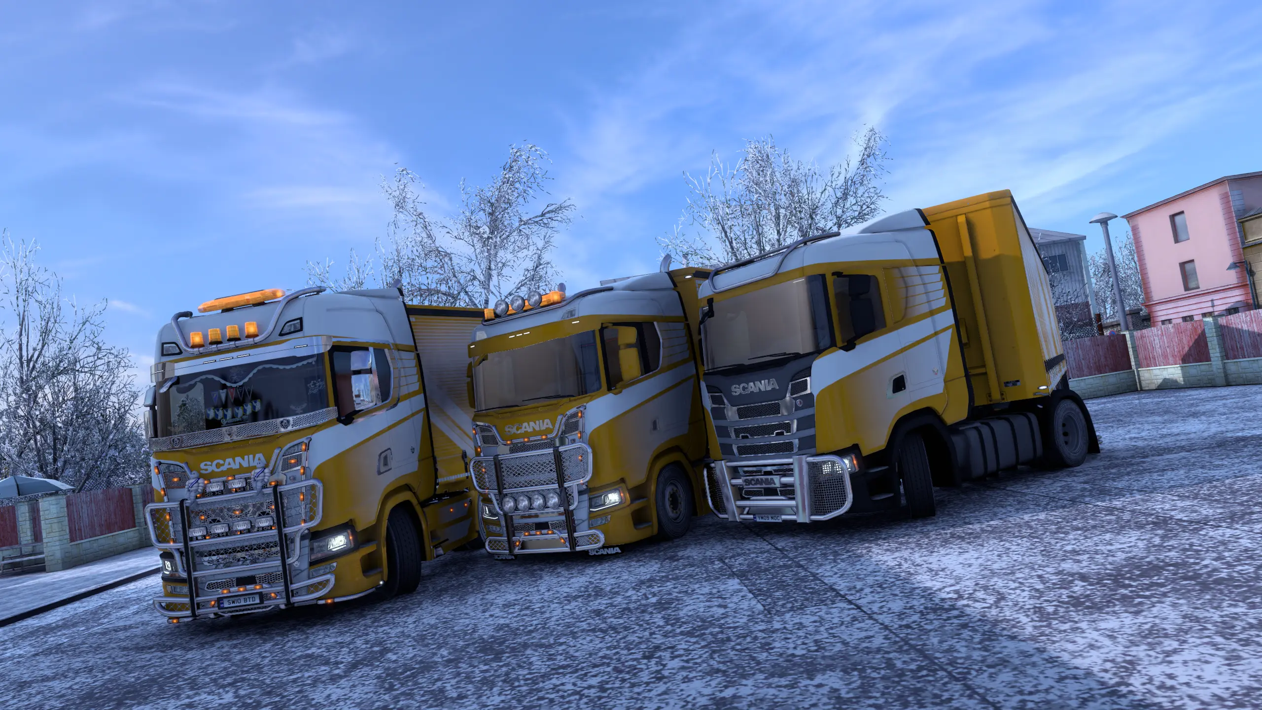 Two GPE trucks in TruckersMP talking a photo next to the fuel station