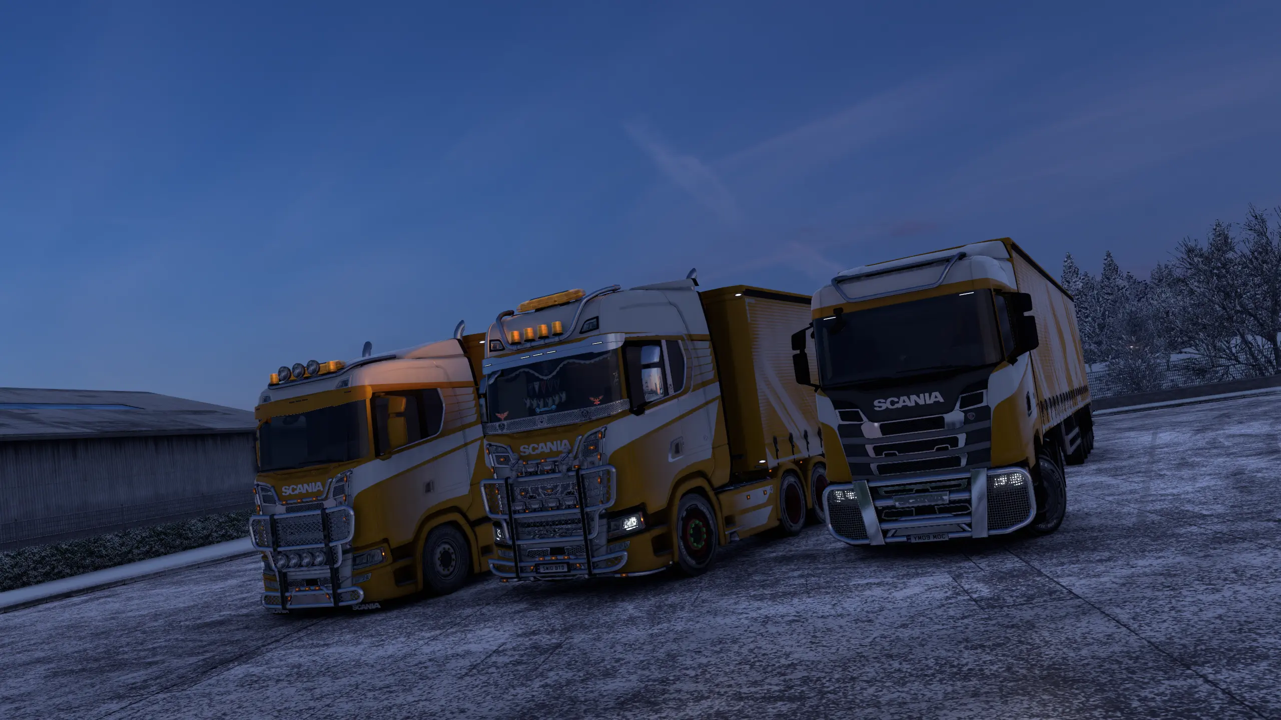 Three GPE trucks parked in a company with a very early version of the GPE paint job