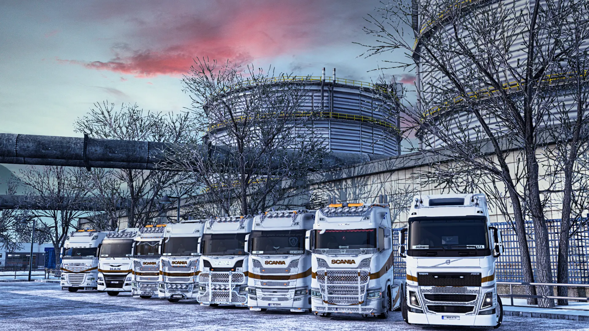 A line of eight GPE trucks parked in a company, in a diagonal line, all trucks are wearing the gold and white paint job